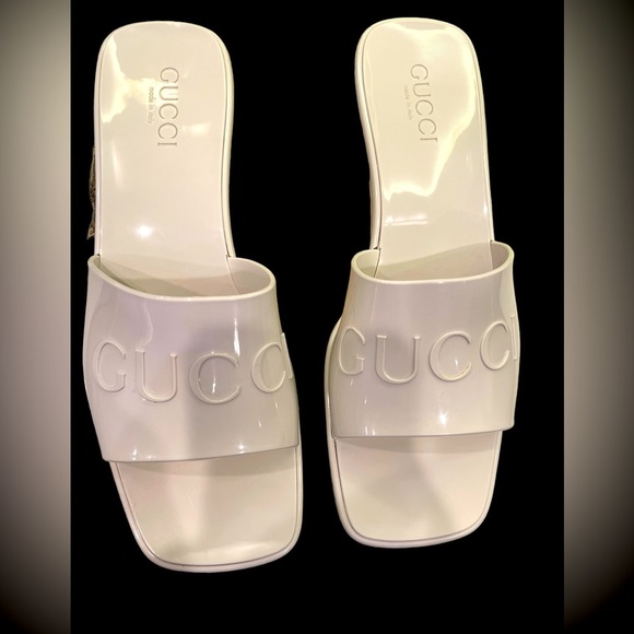 Gucci Shoes - Gucci rubber white embossed logo mules